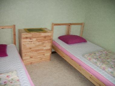 un habitaci�n con 2 camas individuales