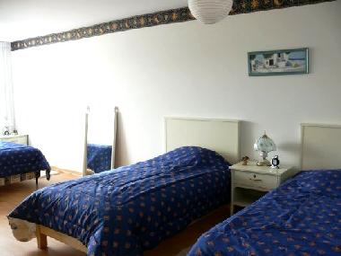 Aqui se ven las 3 camas del BLUE APT