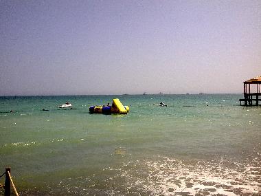 The floating jumping bed and pier ending. Green sea!
