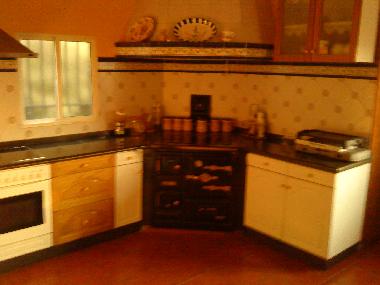 cocina con cocina de lea
