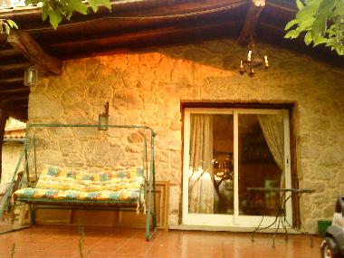 Terraza con porche de madera