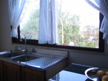 Cocina con vistas panoramicas de la Villa Nina
