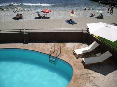 Piscina y playa