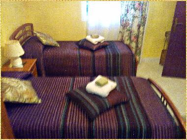 Habitacion con tres camas