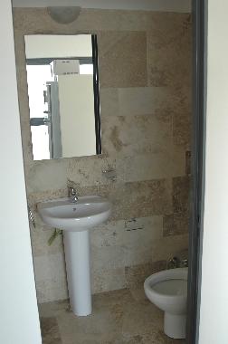 1/2 bath in the living room (the other one is full and it is located  in the master bedroom)