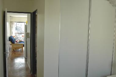 hallway with closets