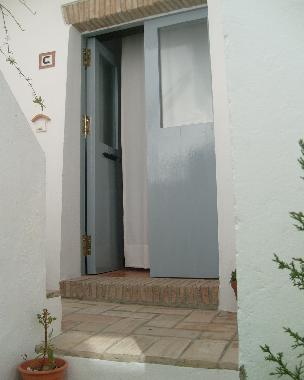Entrada del apartamento C