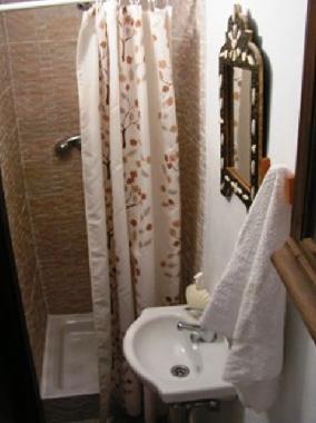 Cuarto de ducha en suite