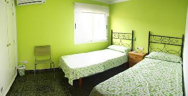 dormitorio de dos camas