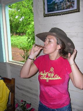         sHE ROLLED HER OWN CIGAR