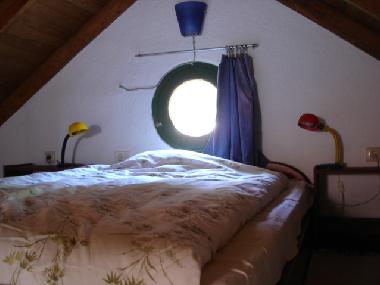 Cama en altillo del apartamento 5