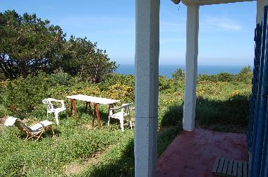 terra�o com vista para o mar e o bosque