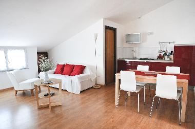 Sala de estar con cocina americana