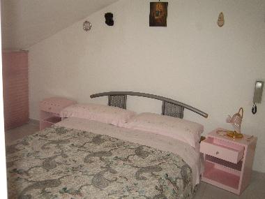 Una de las habitaciones matrimoniales