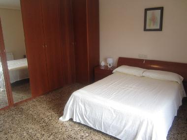 dormitorio con buena vista al mar