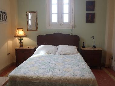 Master bedroom has  a full size bed.