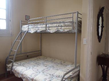 Second bedroom with bunk beds.